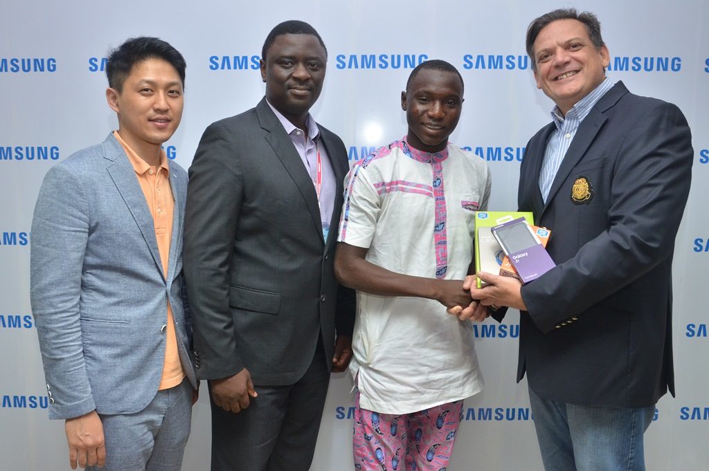 L-R: Manager, Product Marketing, Chaejin Im; Director, Information Technology & Mobile, Mr. Olumide Ojo, both of Samsung Electronics West Africa; Winner, Samsung “Inspire Bigger Dreams” contest, Ibrahim Ambali; and Director & Business Leader, Information Technology and Mobile, Samsung Electronics West Africa, Mr. Emmanouil Revmatas during the presentation of Samsung mobile devices and accessories to winners of its just concluded campaign at Samsung Offices, VI…5/19/2016