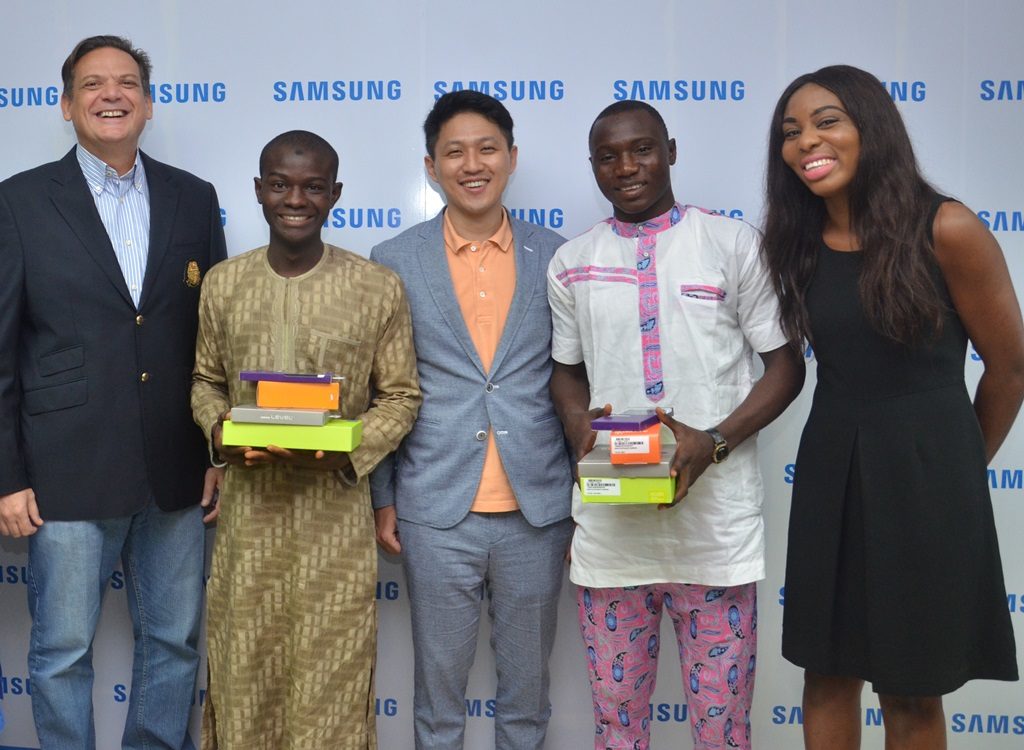 L-R: Director and Business Leader, Information Technology and Mobile, Samsung Electronics West Africa, Mr. Emmanouil Revmatas; Winner, Samsung “Inspire Bigger Dreams” contest, Ibrahim Salihu; Manager, Product Marketing, Samsung Electronics West Africa, Mr. Chaejin Im; Winner, Samsung “Inspire Bigger Dreams” contest, Ibrahim Ambali and Operator/Mobile Communications And Activations Specialist, Samsung Electronics West Africa, Ms. Nkem Odini during the presentation of Samsung mobile devices to winners of its just concluded campaign at Samsung Offices, VI…5/19/2016