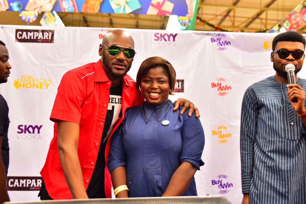 2Baba with a birthday celebrant at Buy N Win Raffle Draw (1)