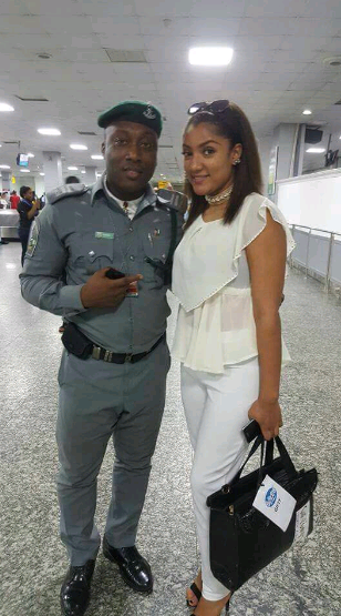 gifty with an airport security guard