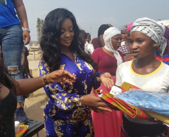 Jackie Appiah donates items to Kayayei to celebrate her birthday.