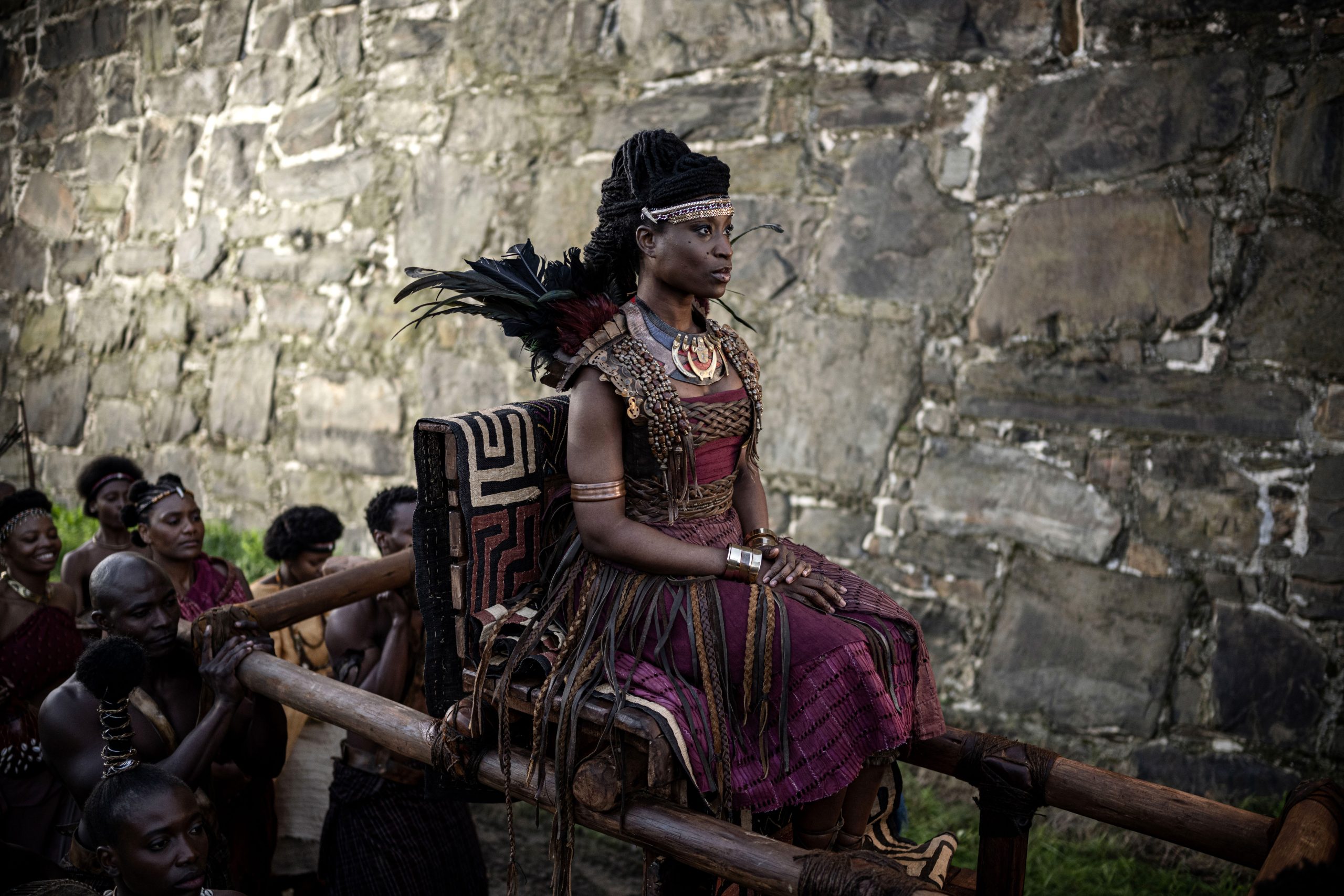 African Queens: Njinga. Njinga (ADESUWA ONI) and her entourage approach the Governor's compound in African Queens: Njinga. Cr. Joe Alblas/Netflix © 2023