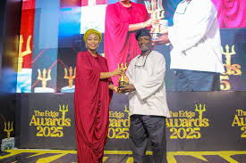 Khadijah Okunnu-Lamidi, CEO, Slice Media and Funso Aina, Senior Manager, External Relations, MTN Nigeria, during the Marketing EDGE Awards presentation, where Funso Aina was honoured as the Outstanding Public Relations & Corporate Communications Personality of the Decade. The event was held at Sheraton Hotel, Ikeja, Lagos, on Friday, September 26, 2025.-OLORISUPERGAL MEDIA