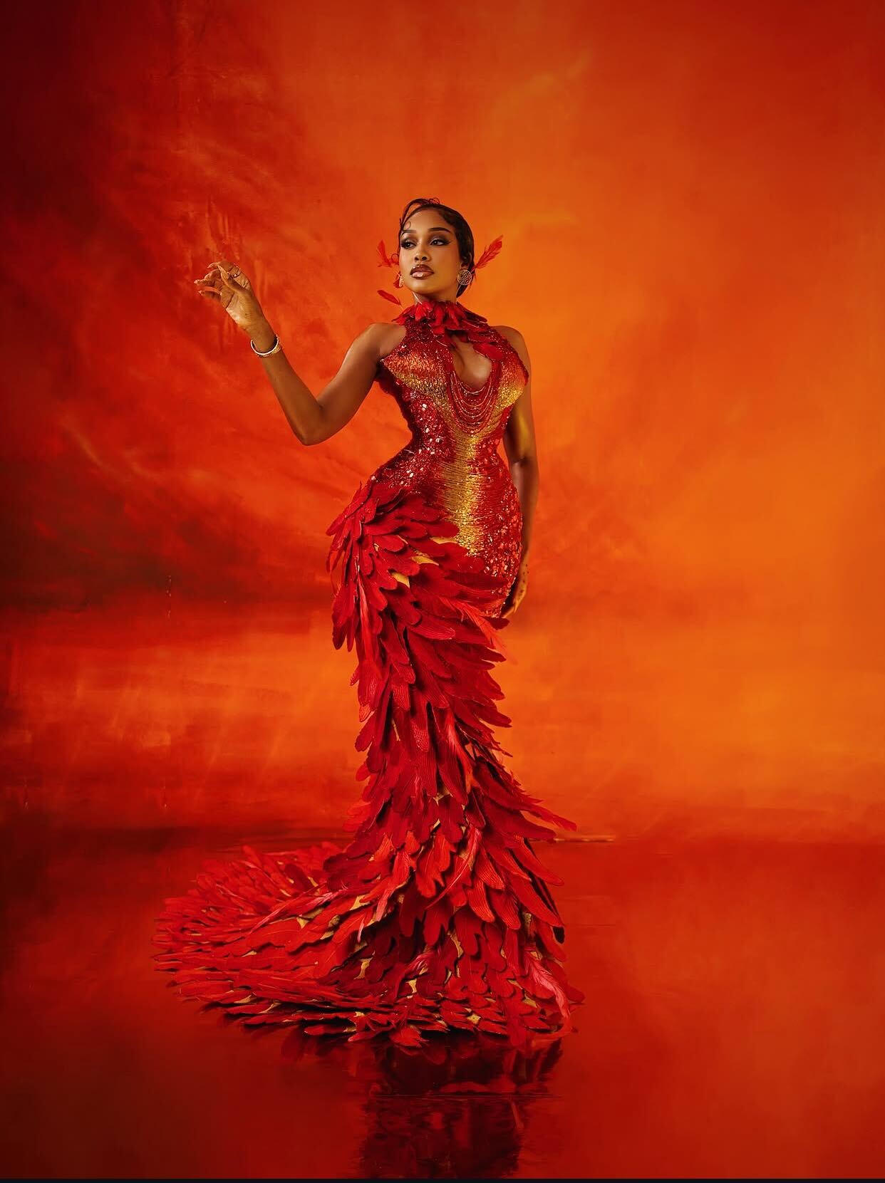 Uche Montana Steals the Spotlight in Striking Red