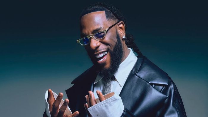 Burna Boy Pays Emotional Tribute to Grandfather at 90th Birthday Celebration
