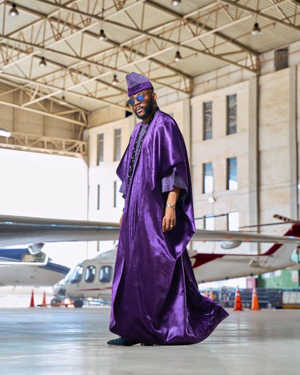 Ebuka Obi-Uchendu Makes a Regal Statement in Purple D29 Africa Agbada